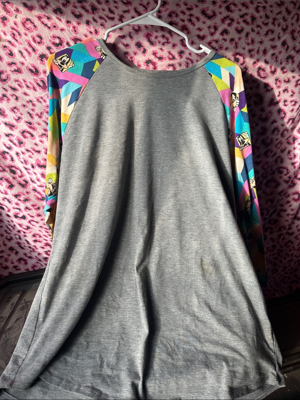LuLaRoe Gray Raglan Top with Multicolor Geometric Cartoon Sleeves